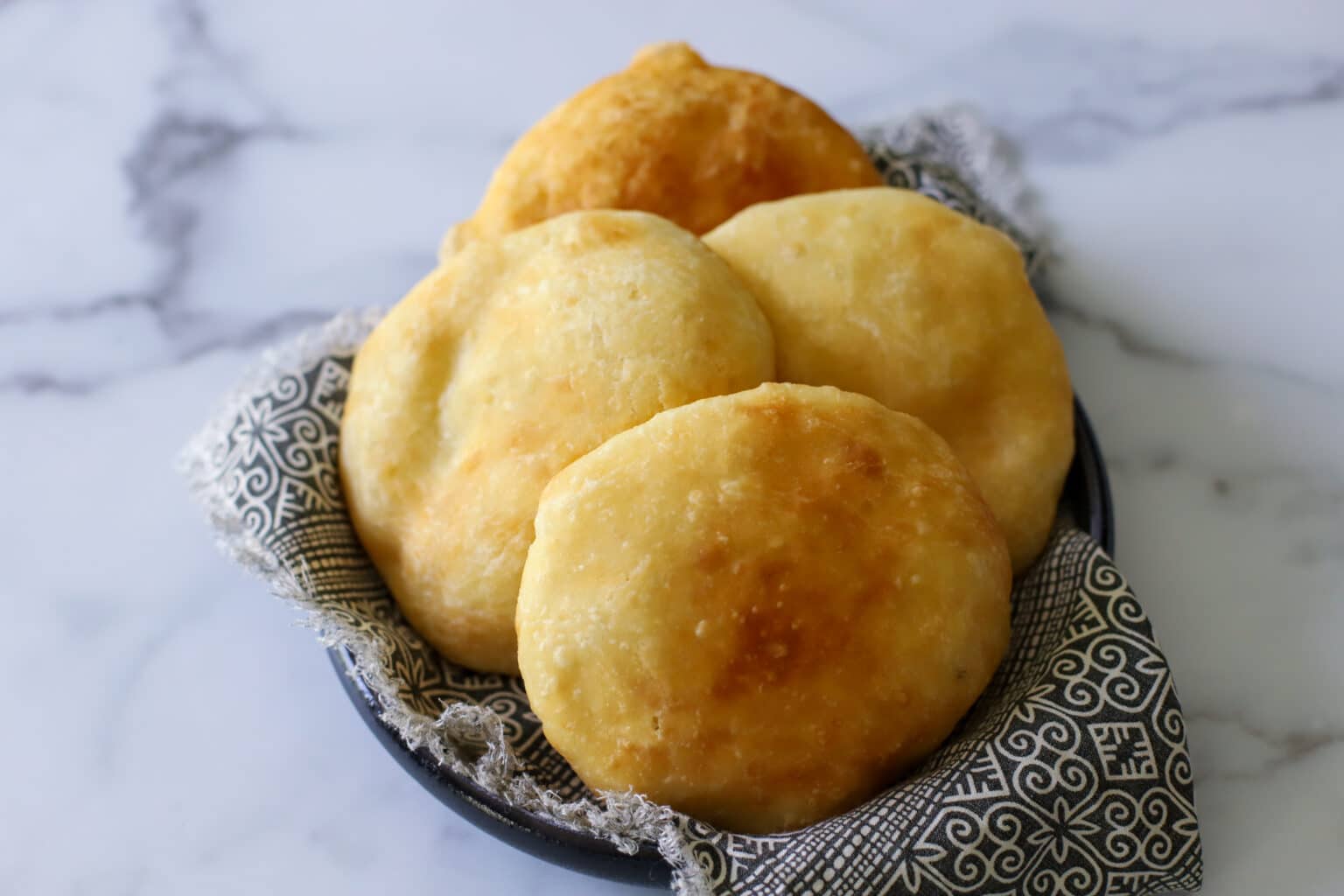Golden Trinidadian fry bake, warm from the pot